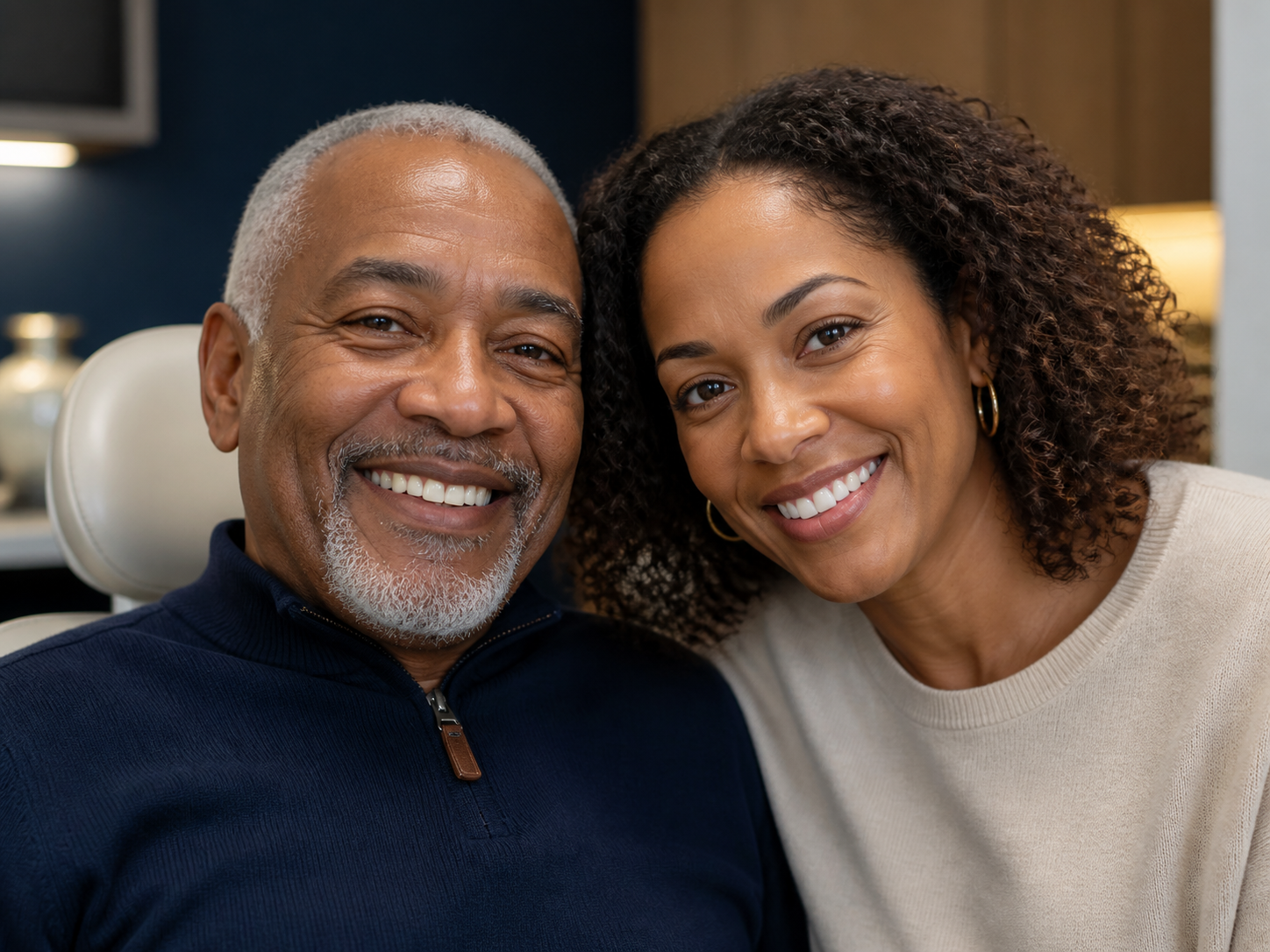 A father and daughter smiling together after a comfortable dental visit